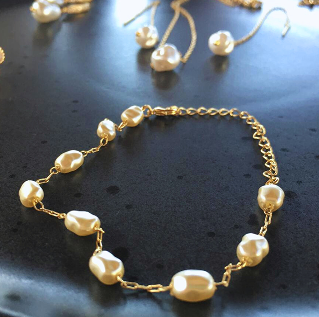 Pulseira de pérolas no ouro 18k